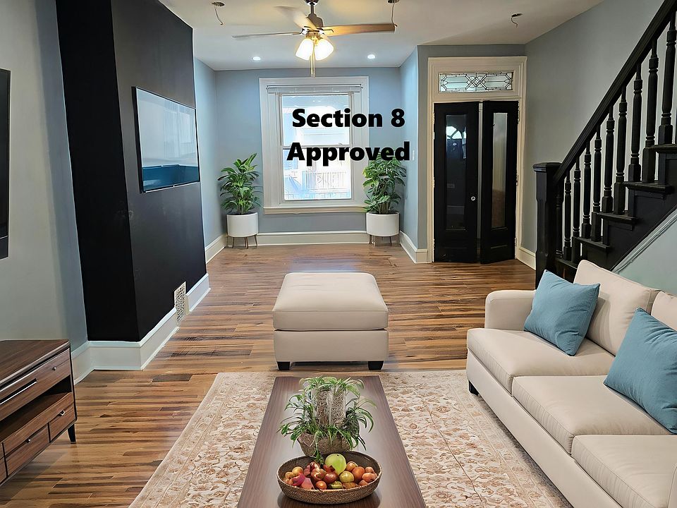 Large living space for family gatherings- Living room has been virtually staged