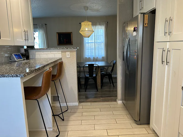 306 E 80th Ter — Photo 10