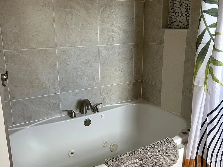 Relax in the large jacuzzi tub/shower!