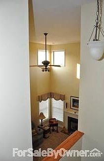 Main Floor Family Room
						:
						View from second floor of two-story family room.