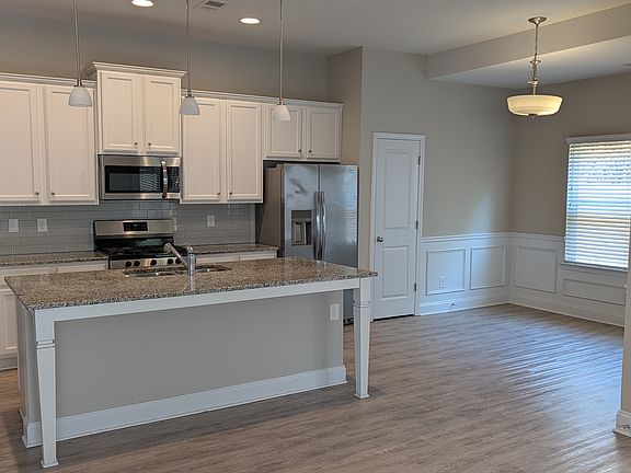 Kitchen with dining area and pantry closet