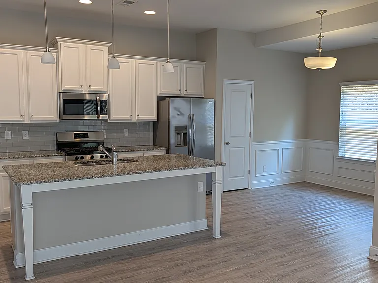 Kitchen with dining area and pantry closet