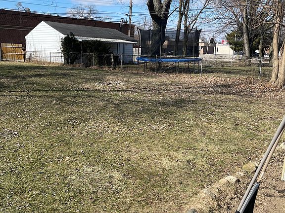 Large, fenced in backyard