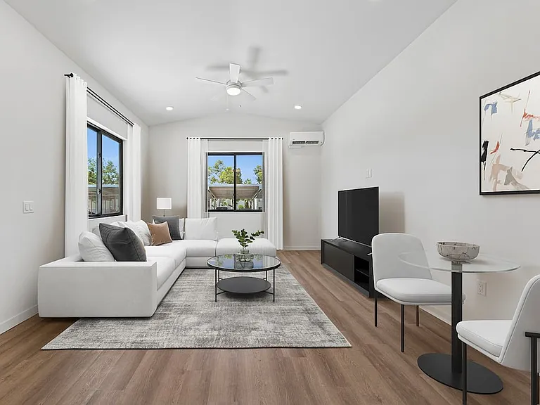 Freestanding Home dining and living room with hard-surface flooring