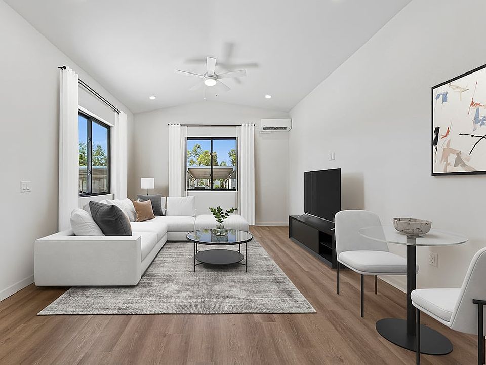 Coming Soon: Renovated Package II dining and living room with hard-surface flooring