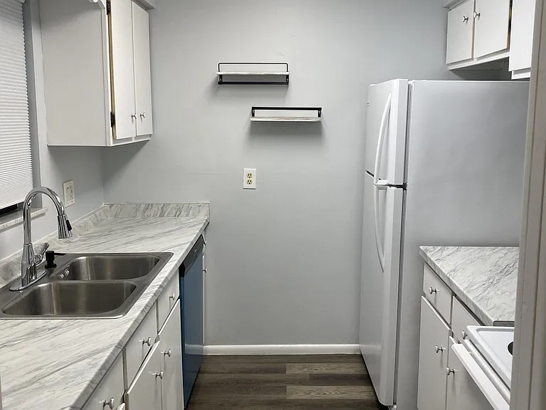 Kitchen with New Counter Top and Dishwasher