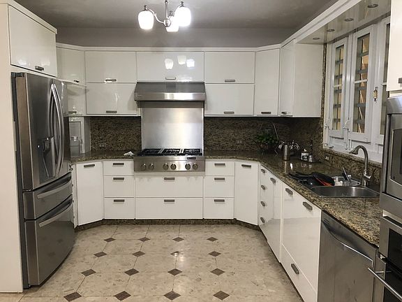 Kitchen has eat in area. 