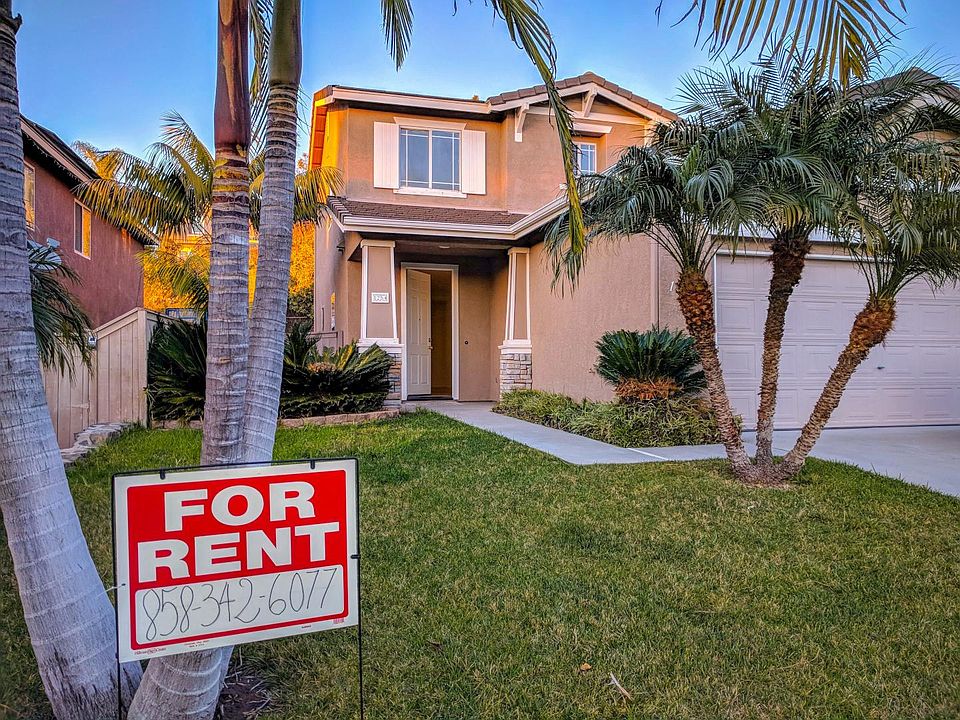 Welcoming front entrance. Direct contact number shown on "For Rent" sign.