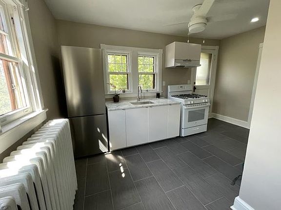 New Kitchen - all new appliances, floors, countertops and lighting!!