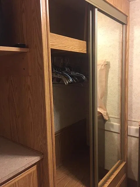 DOUBLE SLIDING MIRROR DOOR CLOSET. HAD TO BE OPEN SO I WOULD NOT SHOW IN THE PHOTO.
