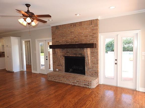 Den with fireplace View 2