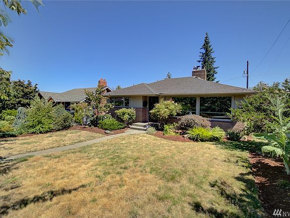Beautiful and functional mid century home and a quiet tree lined street, but close to everything West Seattle has to offer