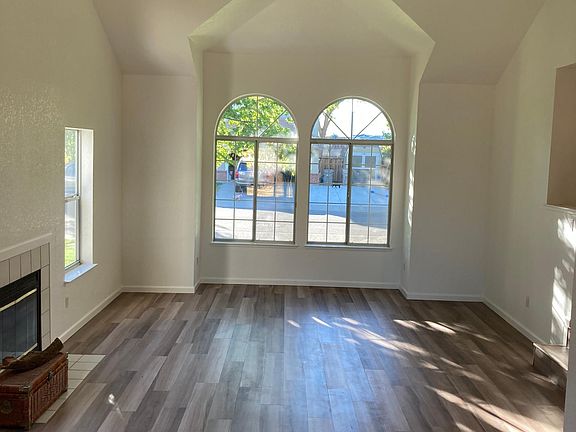 View from Dining Room looking back into Living Room and front of house (street).