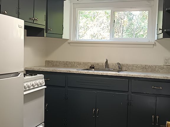 Kitchen with gas stove and lots of extra storage
