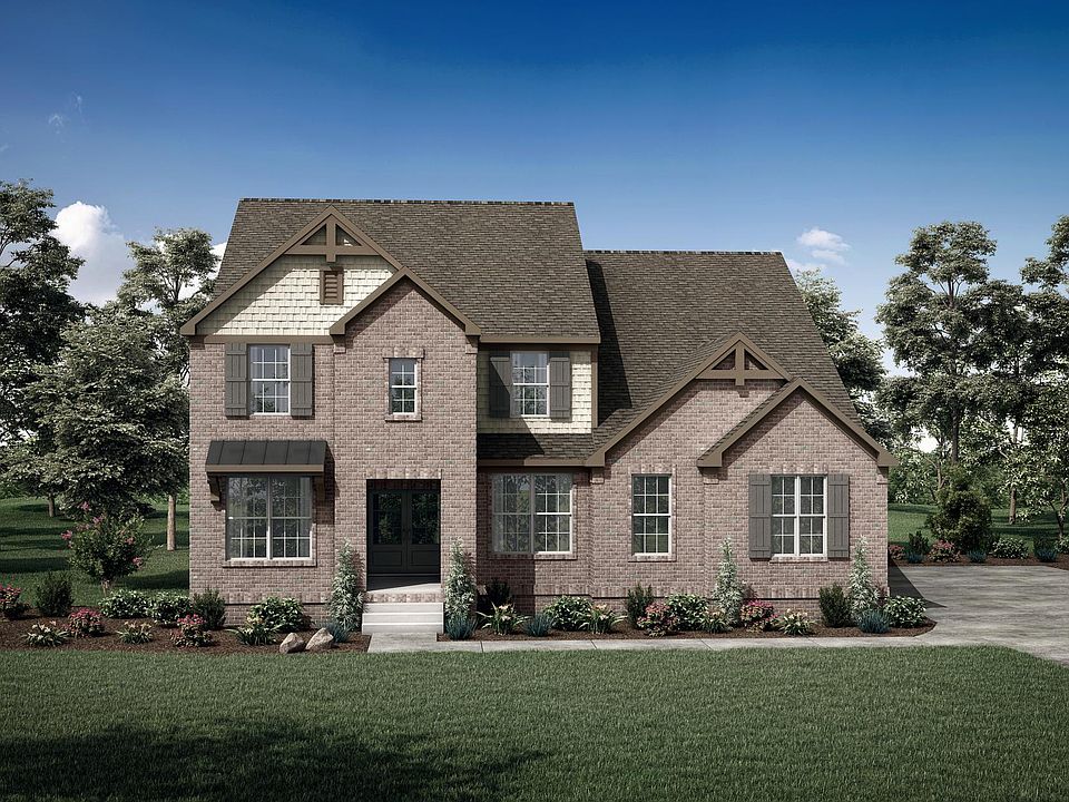 new home with brick and shakes