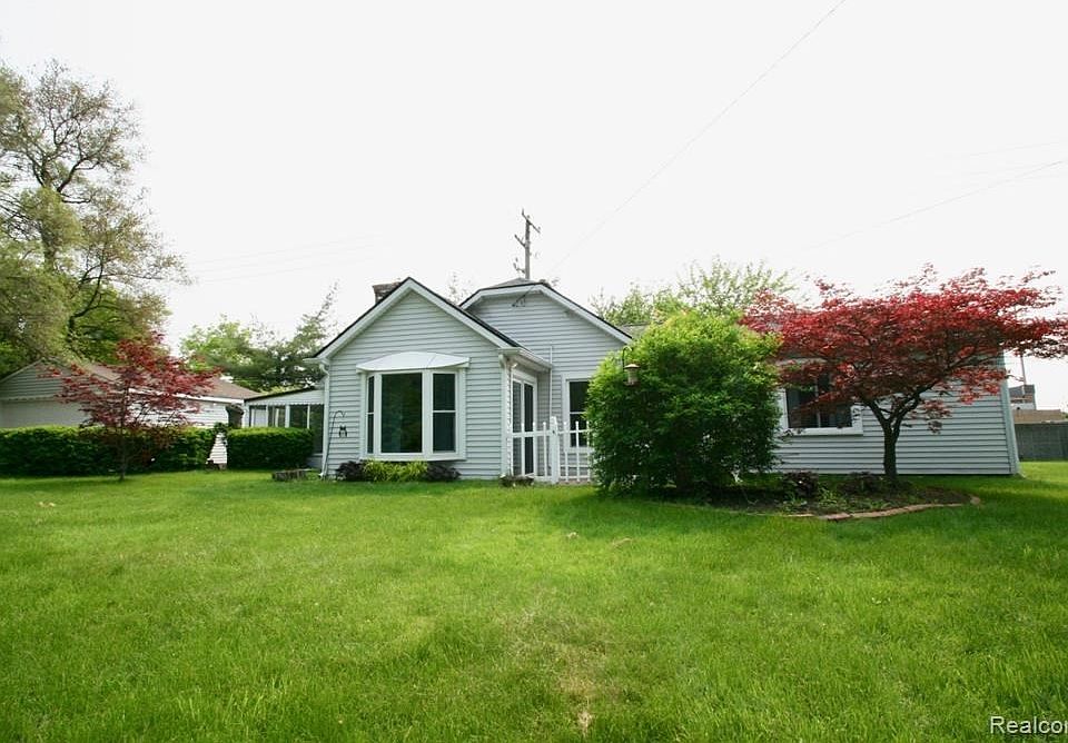 Welcome Home- Oversized Lot with Plenty of Yard Space on the right