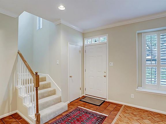 Front entry has tile floor and leads directly into the living room