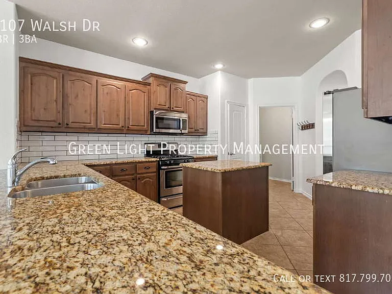5107 Walsh Dr — Photo 9