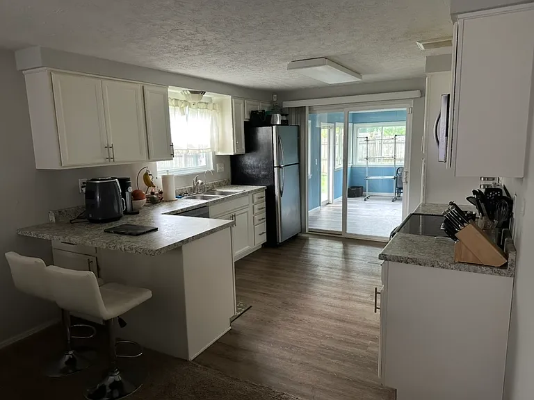 7027 Hubbard Dr — Photo 3