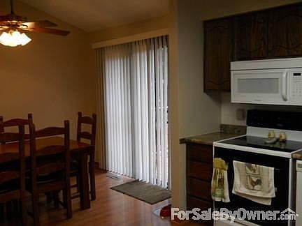 Entry to Kitchen 12x9
						:
						New counters, appliances stay, fridge negotiable. Nice wood laminate flooring.