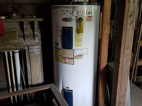 laundry area w/water heater