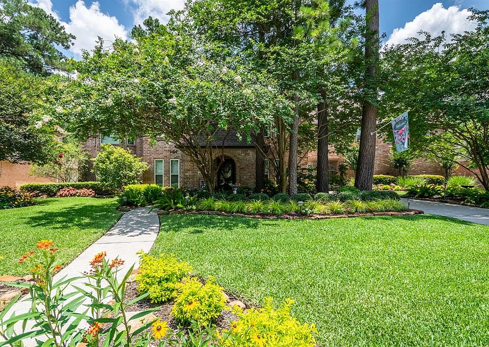 This home has great curb appeal! The yard has been meticulously maintained by a garden club guru to repopulate year after year and conserve water.