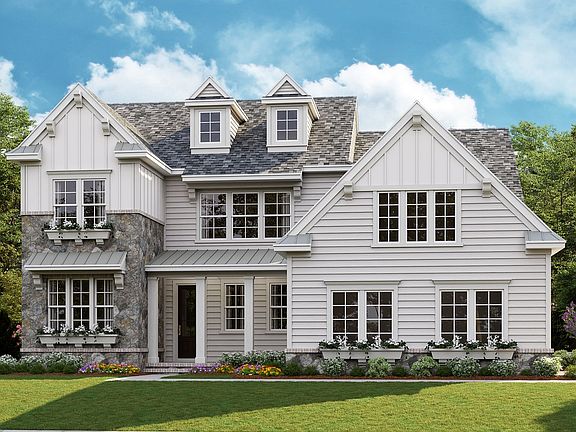 Huntley A - American Cottage 3-Car Side Load Garage Note Renderings may show optional features