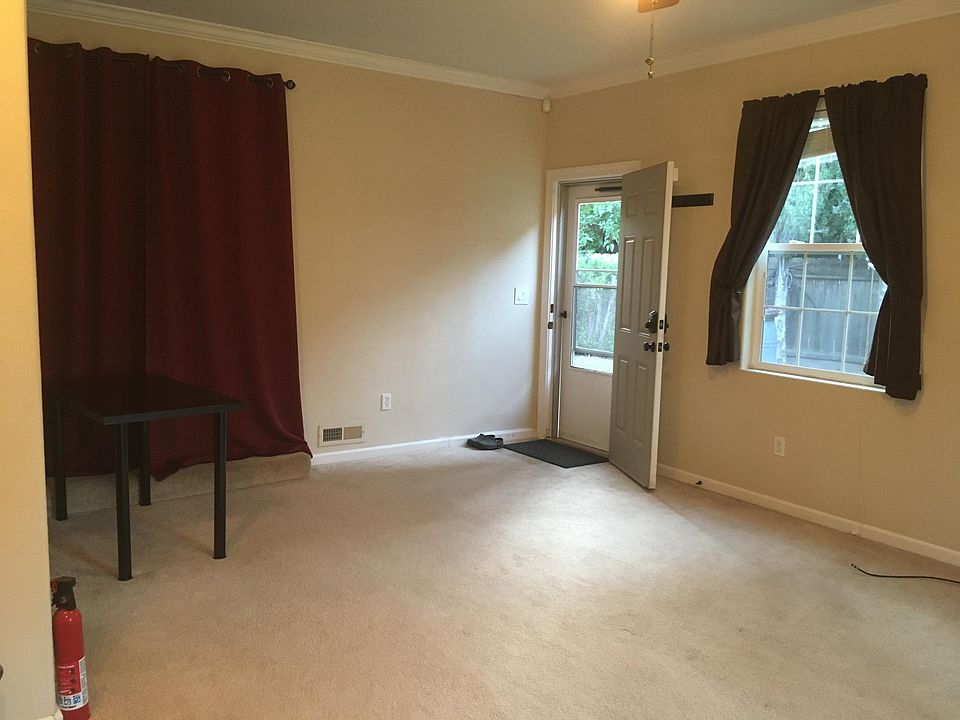 Private entrance. Behind the sound curtain and sound panels are French doors to the main house, which are sealed off.