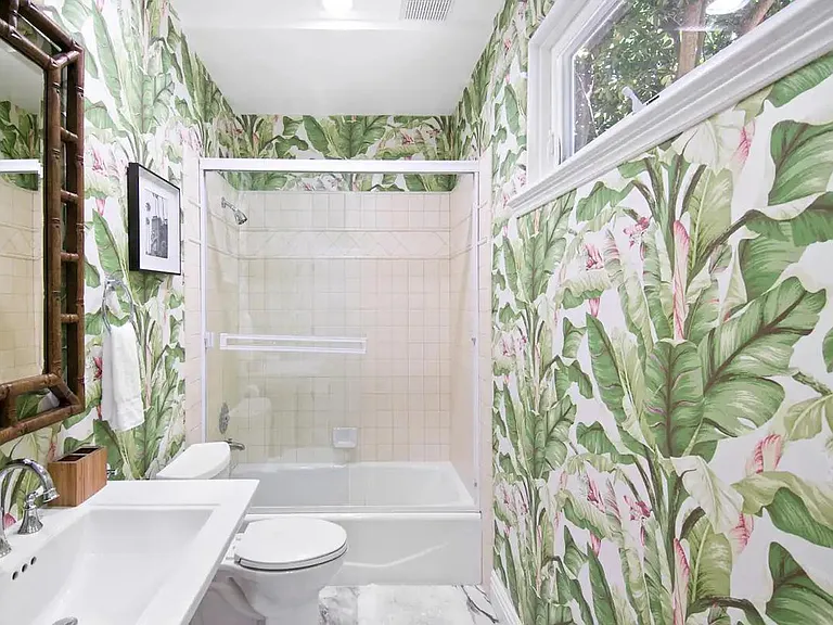 Floral feels in this guest bathroom.