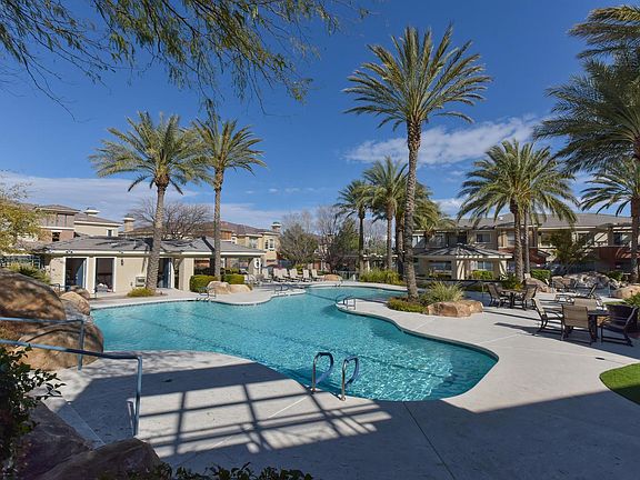 Resort style pool area with 2 heated spas
