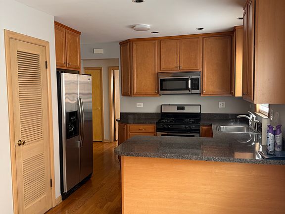 2nd image of 6920 Rosemary Ln #1E