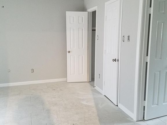 Large master suite with his-n-her walk-in closets.