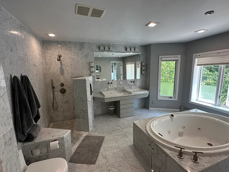 Primary en suite bathroom, open shower, radiant floor heat