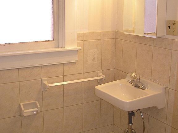 Bath has shower no bathtub