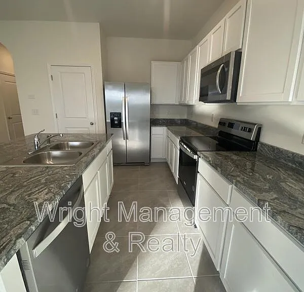 2906 Suncoast Plains Dr — Photo 4