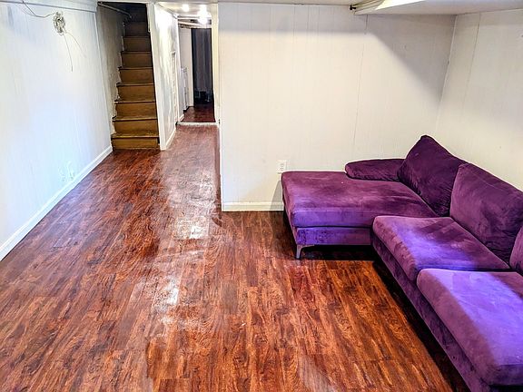 This Ravens purple couch can stay or be removed by the landlord