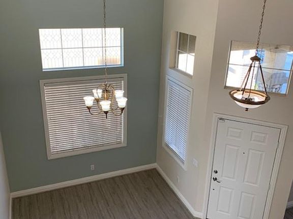 Room on the left can be used as dining room or sitting area.