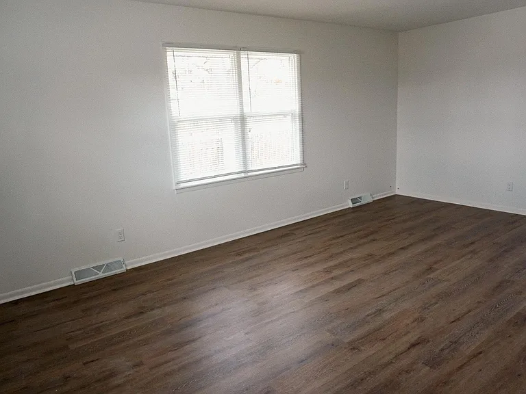 Spacious and cozy living room off of entry