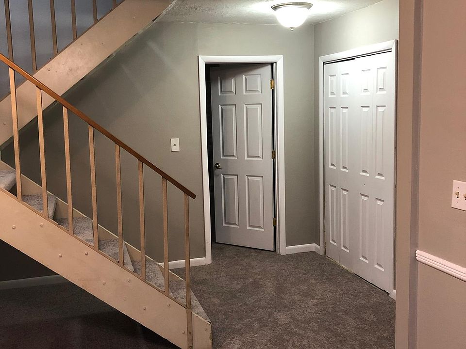 Entry- Laundry behind closet doors