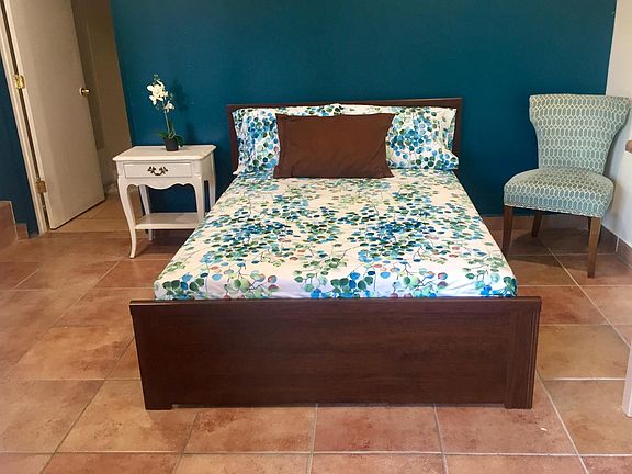 Tiled flooring with room for Queen size bed