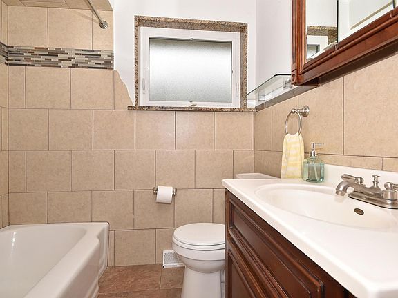 5th image of 4432 N Ozanam Ave