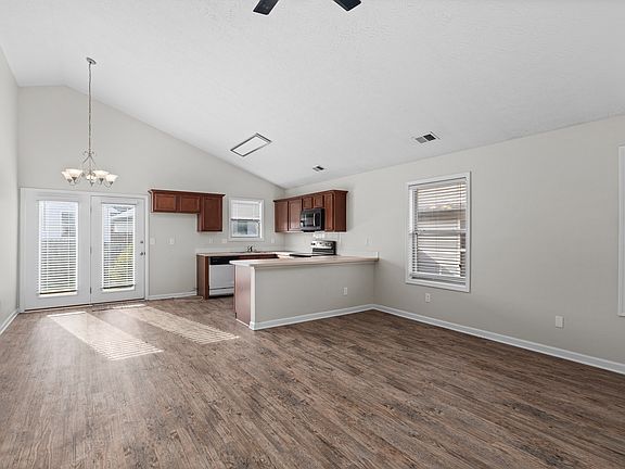 Living room into kitchen and dining area