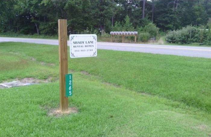 Sign at front of property