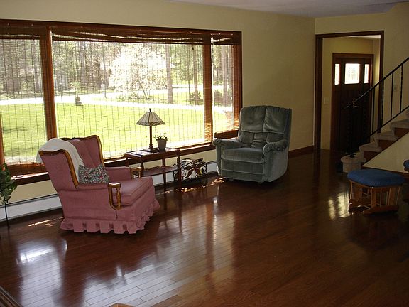 Upper living area with picture window looking toward golf course