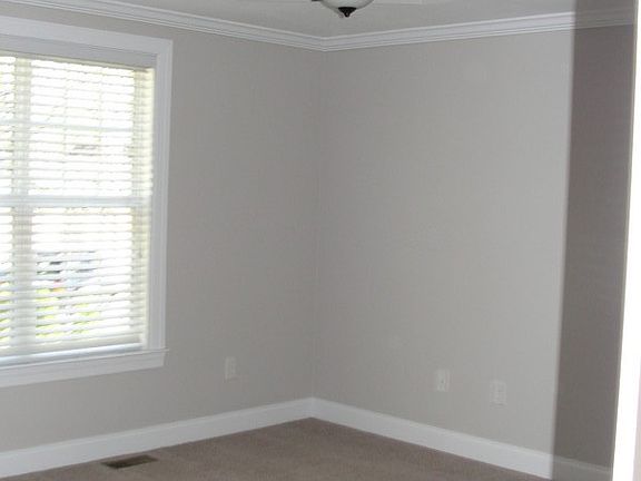 First floor master suite. : Master bedroom with trey ceiling.