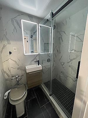 4th image of 60-24 Wetherole St #1
