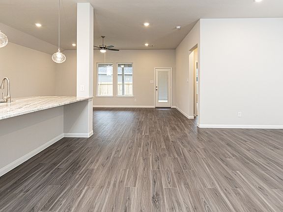Kitchen and Dining Area to Family Room
