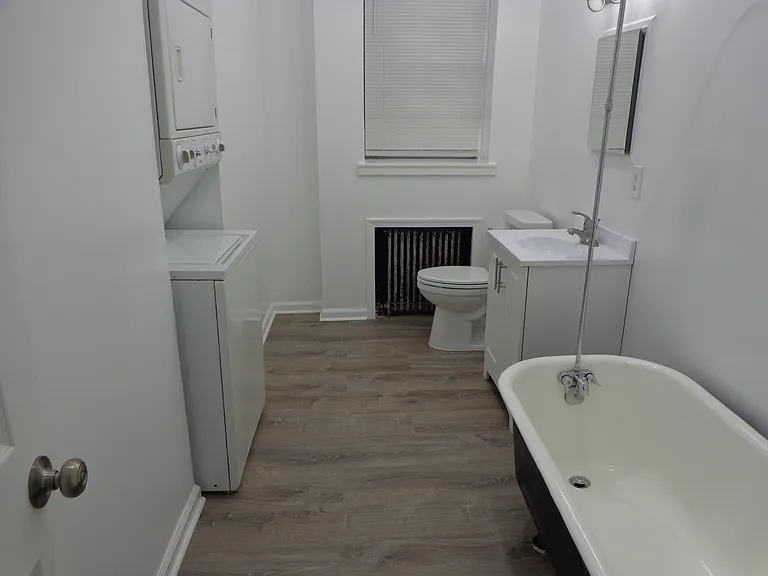 Bathroom with new flooring and new vanity