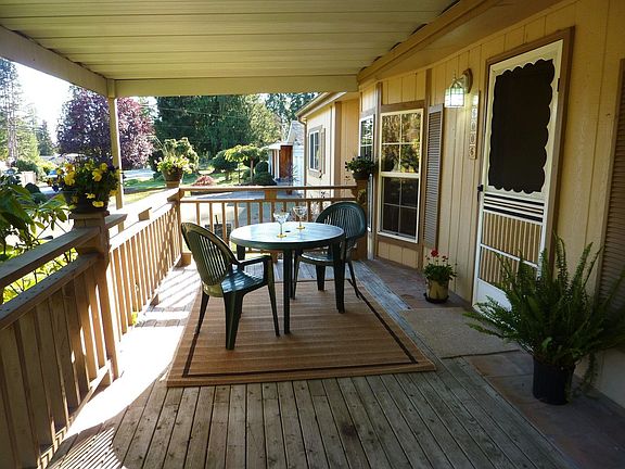 Large covered front porch to enjoy the changing seasons.