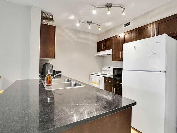 3rd image of 355 N Taralake Way NE #215